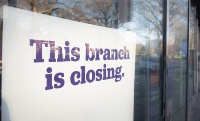 sign saying this bank branch is closed, US bank closures